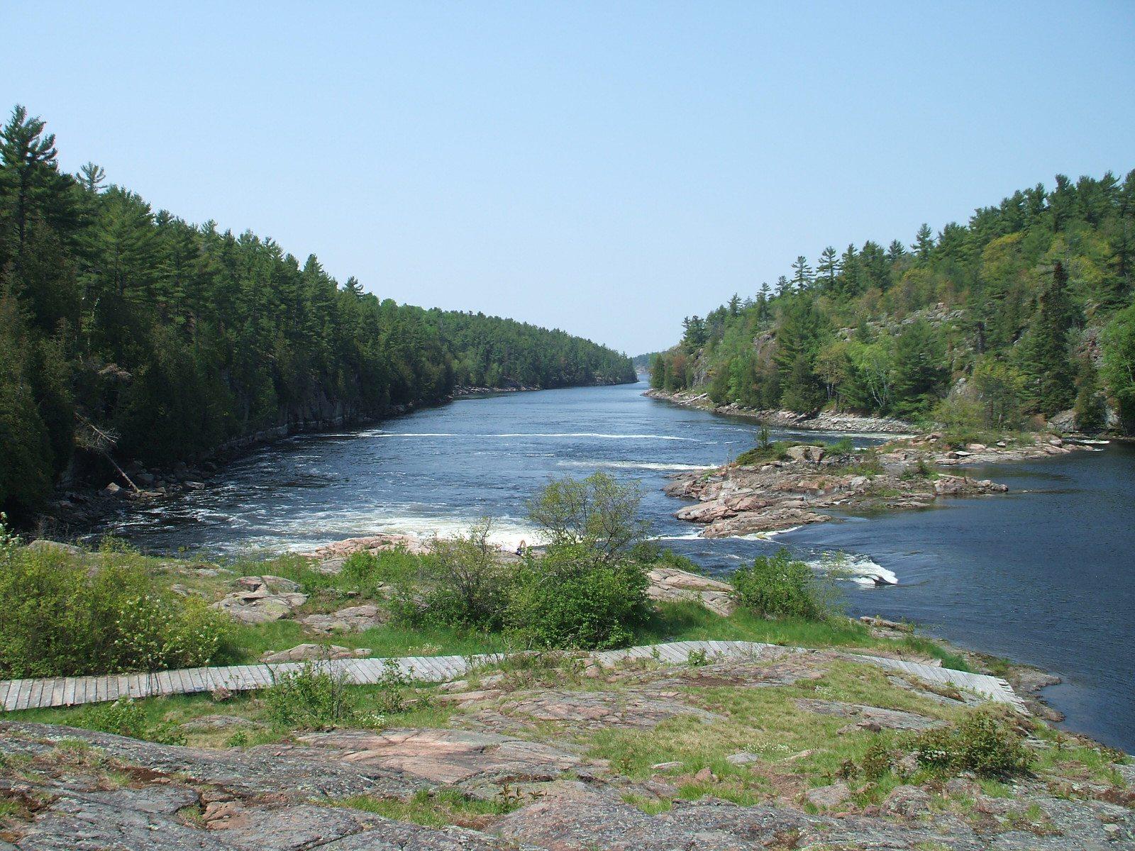 Recollet Falls and forested rocky banks on the French River, Ontario